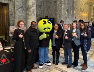 Group at Washington State Capitol in Olympia with Mr. Yuk Mascot