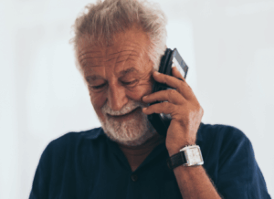 Older man talking on the phone